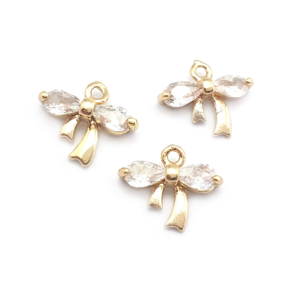 18K ゴールドカラー真鍮とジルコンの蝶結びチャームペンダン - Jewelry Making Knots のレビューと価格