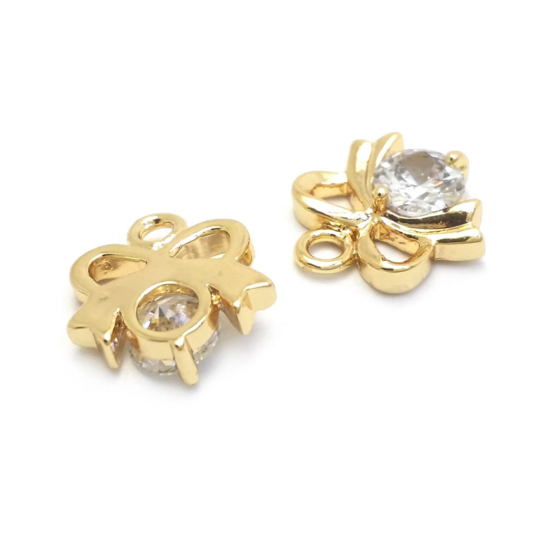18K ゴールドカラー真鍮とジルコンの蝶結びチャームペンダン - Jewelry Making Knots のレビューと価格